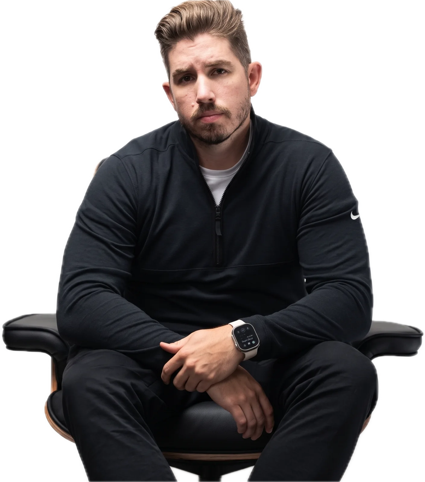 James Rhodes seated in a black quarter-zip
