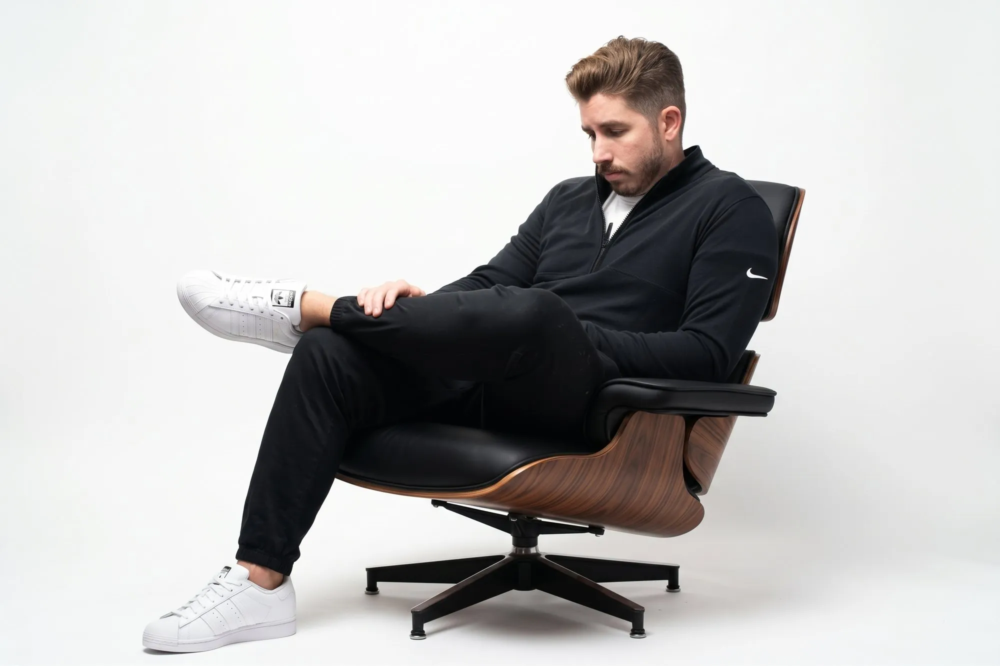 James seated in a lounge chair
